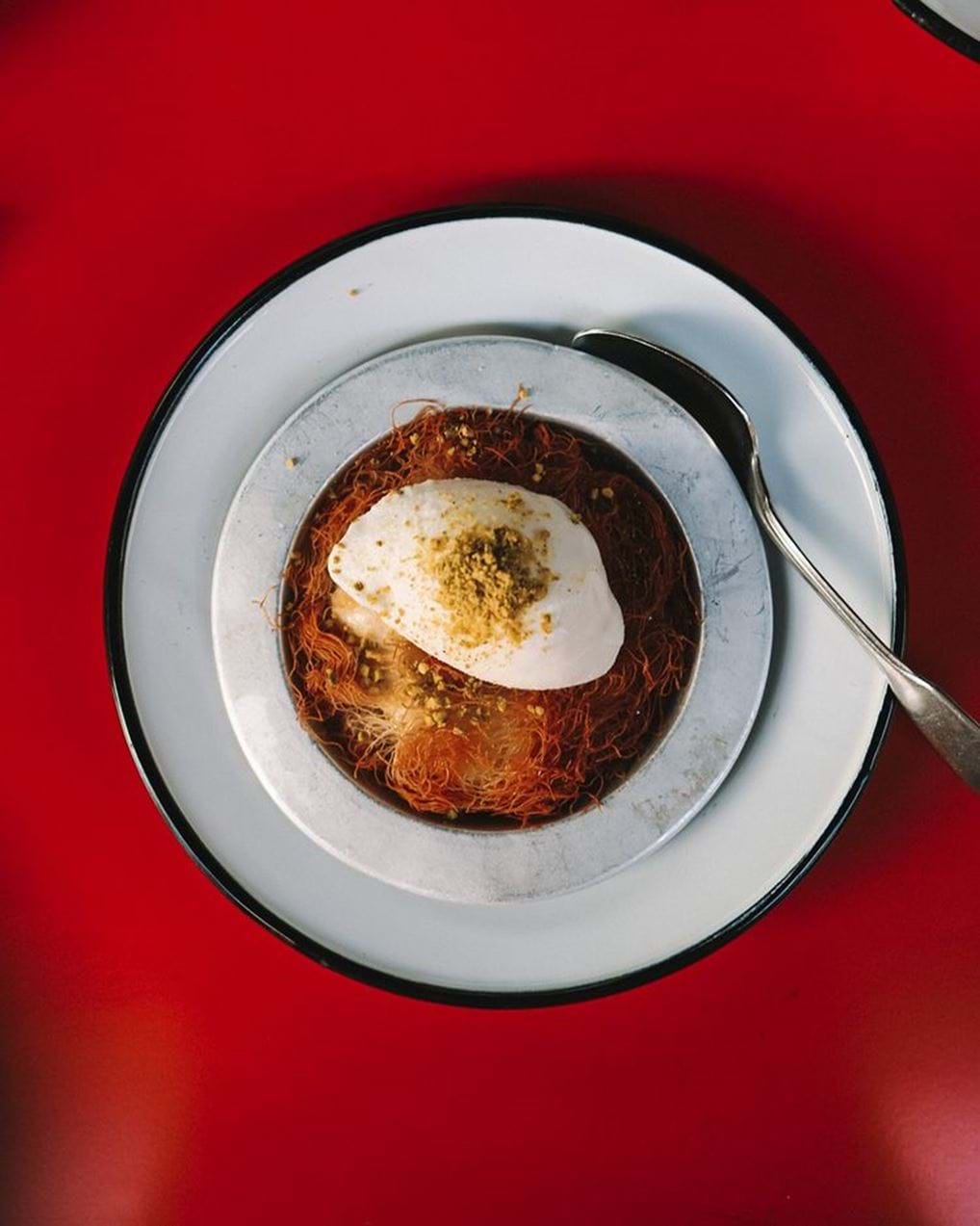 <p><a href="https://www.instagram.com/p/Cwc1tNKqmgh/?img_index=1" rel="noopener noreferrer" target="_blank">@neni.zurich</a> Knafeh & Ilan’s Joghurt Panna Cotta by @0815zurich.</p>